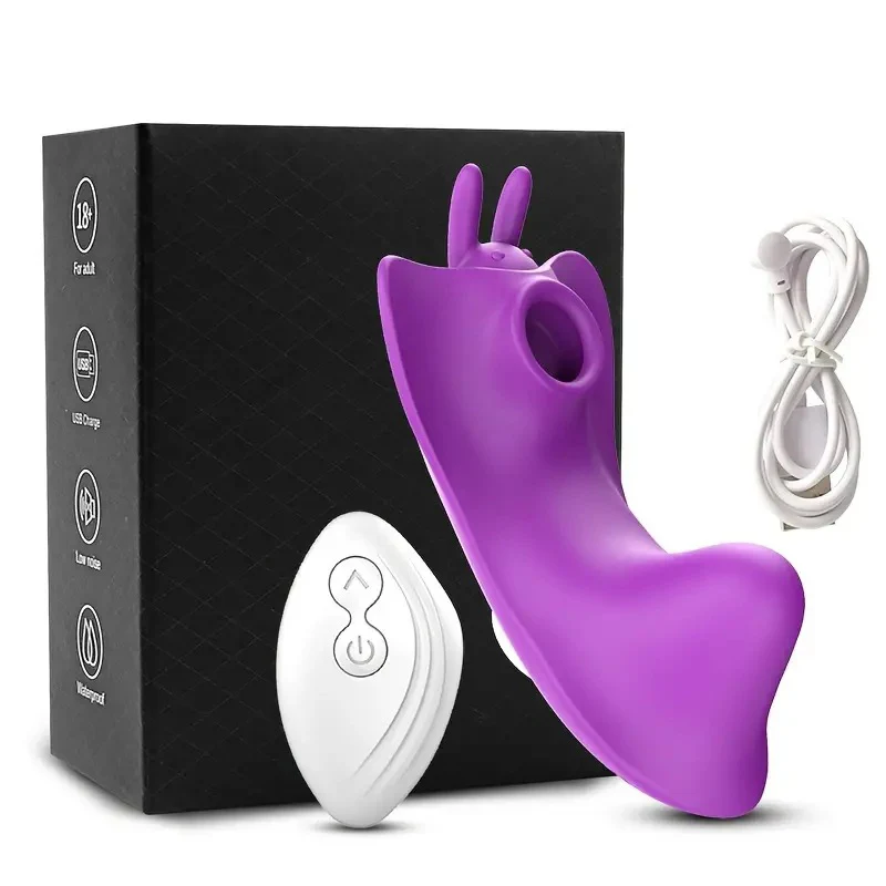 Butterfly sucks on vibrator